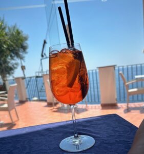 taly Review- A collection of unforgettable moments from our Italy trip—wandering the streets of Rome, taking in coastal views in Praiano, and soaking up the charm of Naples and the Amalfi Coast.